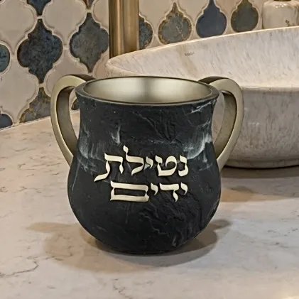 נטלה יוקרתית - שיש שחור שילוב זהב